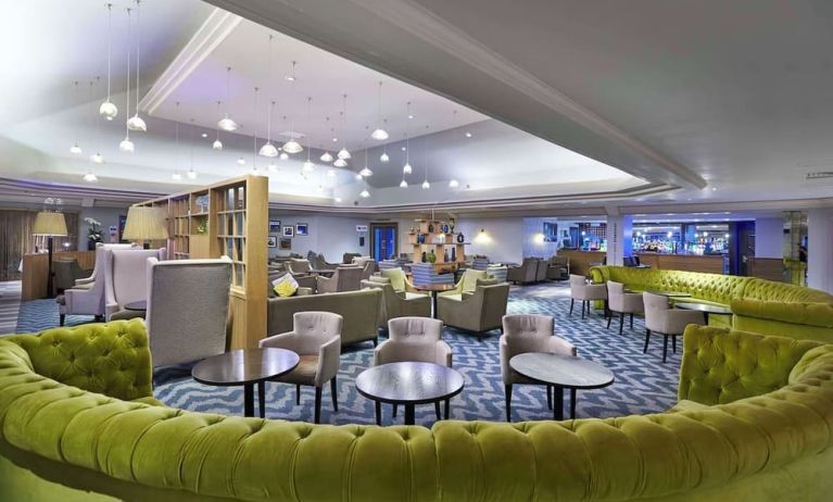 Hotel bar and lounge area with stylish and comfortable workspace at the DoubleTree by Hilton Bristol North.