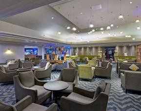 Elegant dining area with tables and chairs at the DoubleTree by Hilton Bristol North.