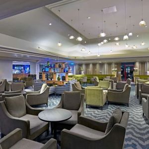 Elegant dining area with tables and chairs at the DoubleTree by Hilton Bristol North.