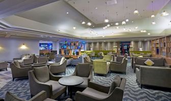 Elegant dining area with tables and chairs at the DoubleTree by Hilton Bristol North.