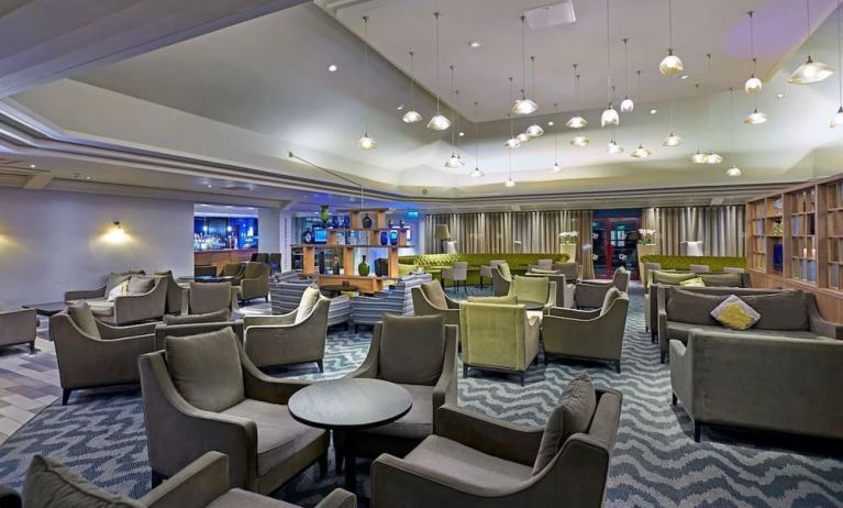 Elegant dining area with tables and chairs at the DoubleTree by Hilton Bristol North.