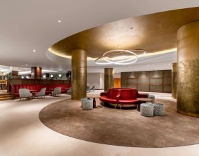 Lobby workspace with chairs and sofas at the Hilton Birmingham Metropole.