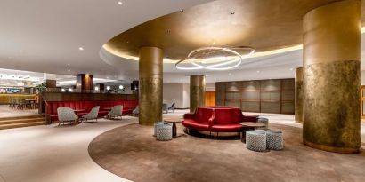 Lobby workspace with chairs and sofas at the Hilton Birmingham Metropole.