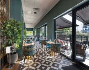 Hotel restaurant with lake view at the Hilton Birmingham Metropole.