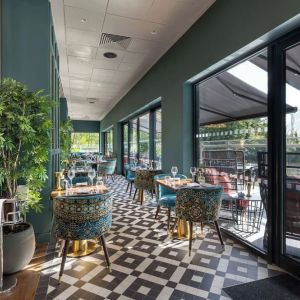 Hotel restaurant with lake view at the Hilton Birmingham Metropole.