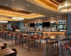 Hotel bar with lounge area and comfortable sitting, perfect for co-working at the Hilton Birmingham Metropole.