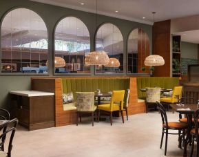 Stylinsh dining area with comfortable mobiliary perfect for co-working at the Hilton Birmingham Metropole.