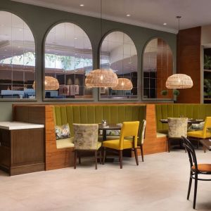 Stylinsh dining area with comfortable mobiliary perfect for co-working at the Hilton Birmingham Metropole.