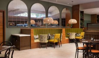 Stylinsh dining area with comfortable mobiliary perfect for co-working at the Hilton Birmingham Metropole.