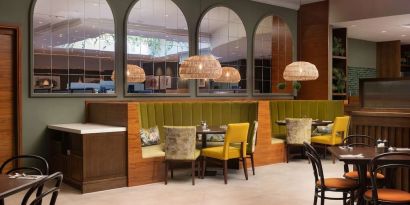 Stylinsh dining area with comfortable mobiliary perfect for co-working at the Hilton Birmingham Metropole.