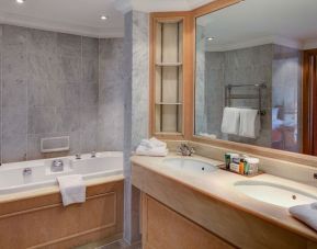 Day use guest bathroom with tub and toiletries at the Hilton Birmingham Metropole.