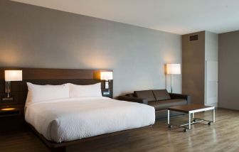 Spacious day use room with natural light at AC Hotel Cincinnati At Liberty Center.