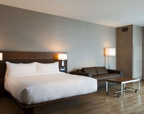 Spacious day use room with natural light at AC Hotel Cincinnati At Liberty Center.