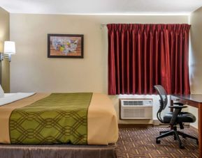 King room with work desk at Coratel Inn & Suites By Jasper River Falls.