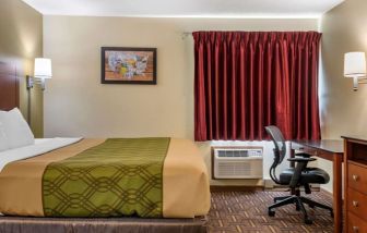 King room with work desk at Coratel Inn & Suites By Jasper River Falls.