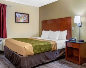 King room at Coratel Inn & Suites By Jasper River Falls.