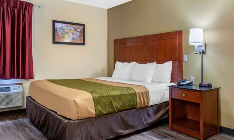 King room at Coratel Inn & Suites By Jasper River Falls.