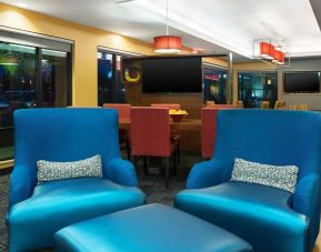 Lobby and coworking lounge at TownePlace Suites By Marriott Shreveport-Bossier City.