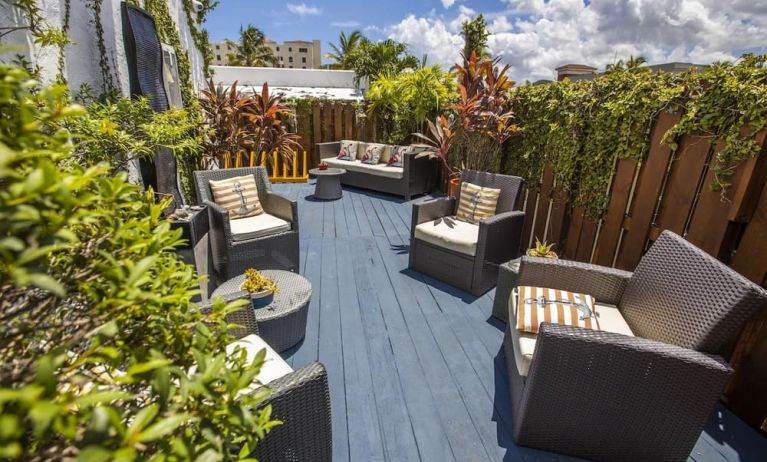 Comfortable outdoor meeting space at Hollywood Beach Suites, A South Beach Group Hotel.