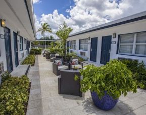 Relaxing outdoor terrace at Hollywood Beach Suites, A South Beach Group Hotel.