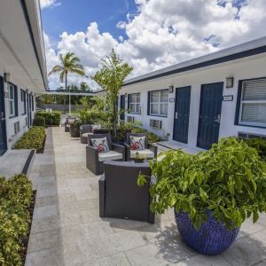 Relaxing outdoor terrace at Hollywood Beach Suites, A South Beach Group Hotel.