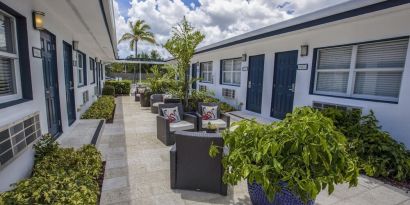 Relaxing outdoor terrace at Hollywood Beach Suites, A South Beach Group Hotel.