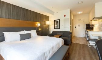 Day use king suite with work desk, private bathroom and in-room kitchen at Executive Residency By Best Western.