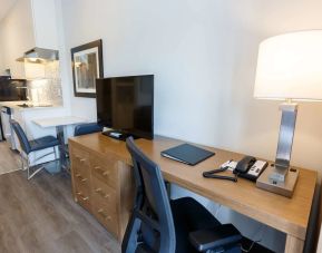 Day use guest room with work desk and in-door kitchen at Executive Residency By Best Western.