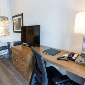 Day use guest room with work desk and in-door kitchen at Executive Residency By Best Western.