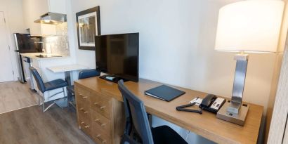 Day use guest room with work desk and in-door kitchen at Executive Residency By Best Western.