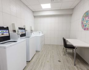 Laundry facility at Executive Residency By Best Western.