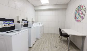 Laundry facility at Executive Residency By Best Western.