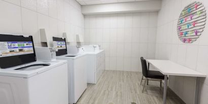 Laundry facility at Executive Residency By Best Western.