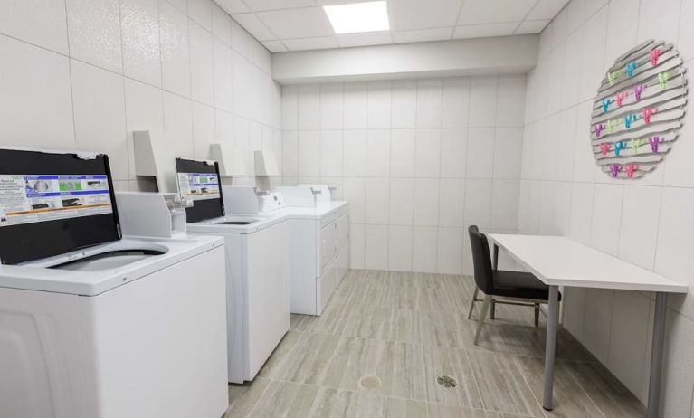 Laundry facility at Executive Residency By Best Western.