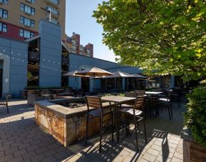 Outdoor bar with lounge area, perfect for co-working at Hilton Whistler Resort & Spa.