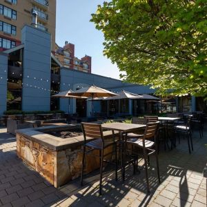 Outdoor bar with lounge area, perfect for co-working at Hilton Whistler Resort & Spa.