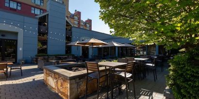 Outdoor bar with lounge area, perfect for co-working at Hilton Whistler Resort & Spa.