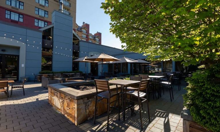 Outdoor bar with lounge area, perfect for co-working at Hilton Whistler Resort & Spa.