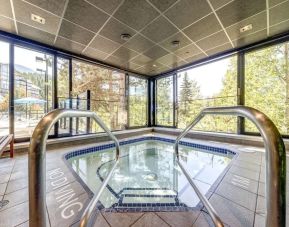 Indoor heated pool at Hilton Whistler Resort & Spa.