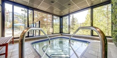 Indoor heated pool at Hilton Whistler Resort & Spa.