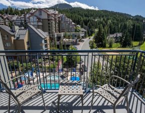 Room terrace with panoramic view at Hilton Whistler Resort & Spa.