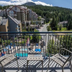 Room terrace with panoramic view at Hilton Whistler Resort & Spa.