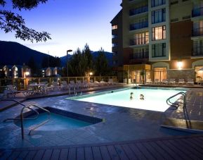 Romantic outdoor pool at Hilton Whistler Resort & Spa.