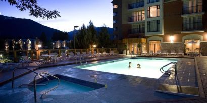 Romantic outdoor pool at Hilton Whistler Resort & Spa.