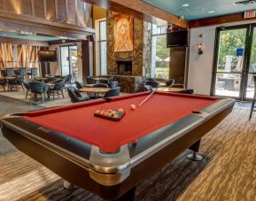 Game room and lounge area at Hilton Whistler Resort & Spa.