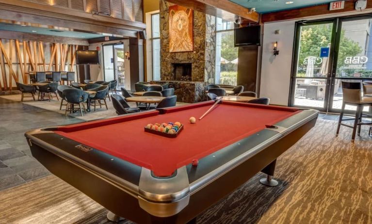 Game room and lounge area at Hilton Whistler Resort & Spa.