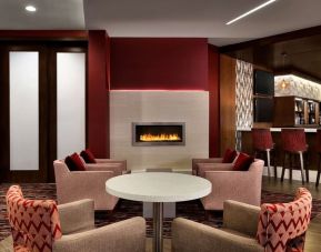 Lounge area with fire place at the Double Tree Toronto Airport West.