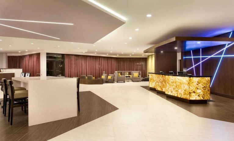 Hotel lobby with lounge area and work space  at the Double Tree Toronto Airport West.