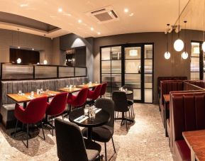 Dining area perfect for coworking at Euston Square Hotel.