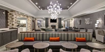 Lounge area with comfortable mobiliary perfect for co-working at Homewood Suites By Hilton Burlington.